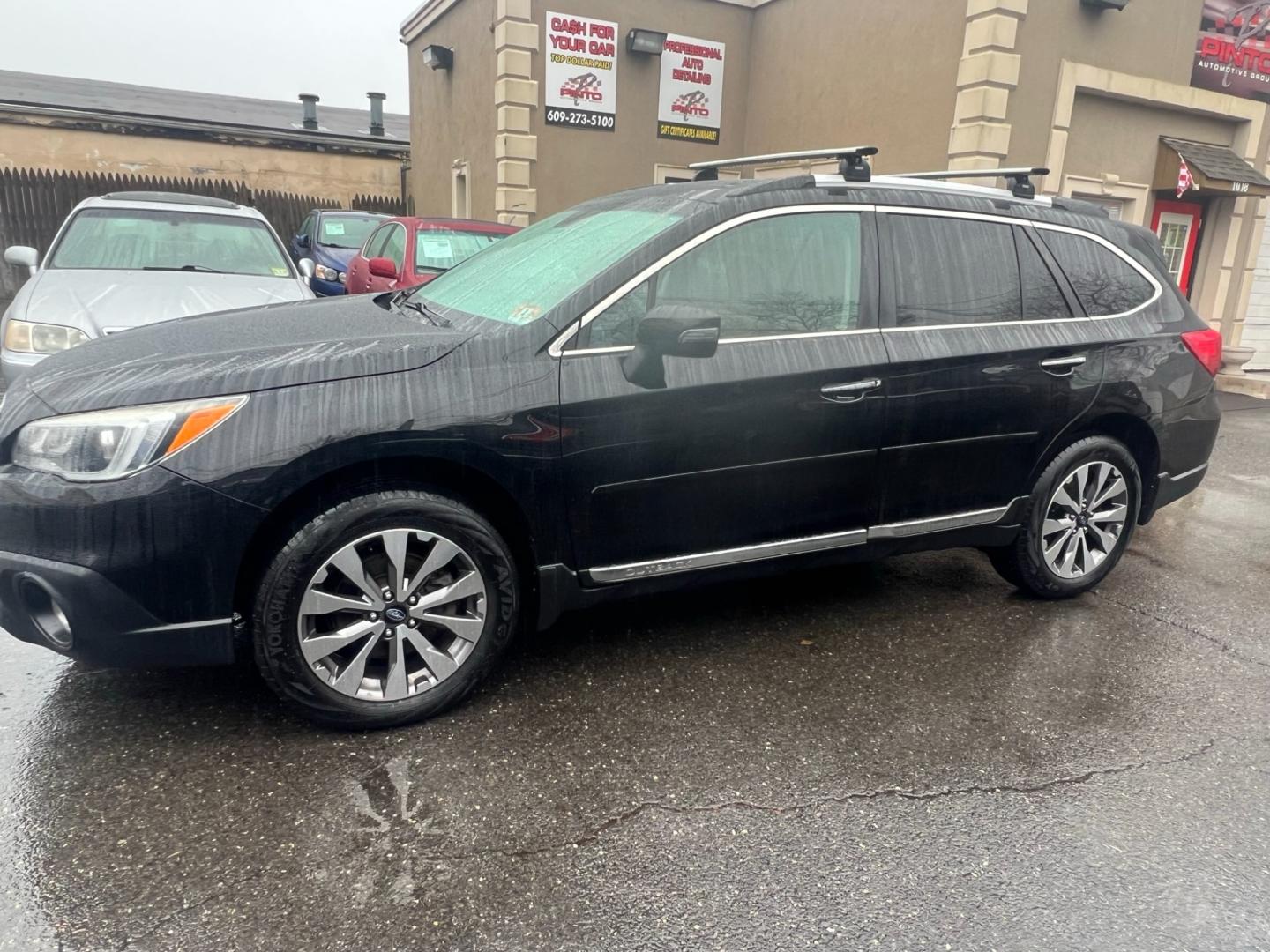 2017 BLACK /Brown Leather Subaru Outback 2.5i Touring (4S4BSETCXH3) with an 2.5L H4 DOHC 16V engine, 6A transmission, located at 1018 Brunswick Ave, Trenton, NJ, 08638, (609) 989-0900, 40.240086, -74.748085 - Photo#1